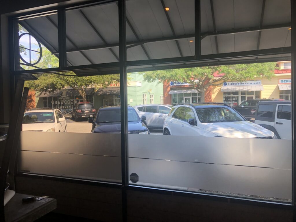 Glare reduction window film in a restaurant in Seaside Farms in Mount Pleasant